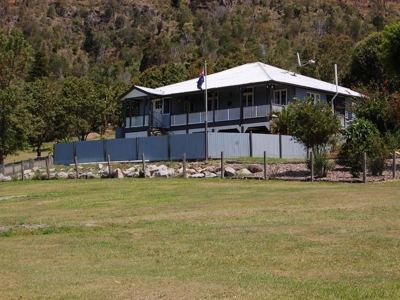 House with Mt Archer behind.jpg